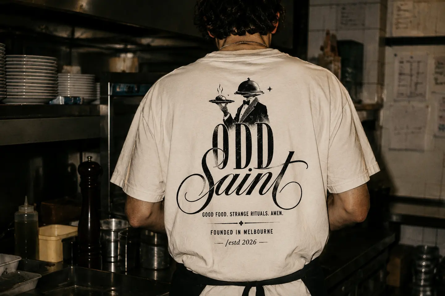 Odd Saint printed identity application with warm hospitality styling